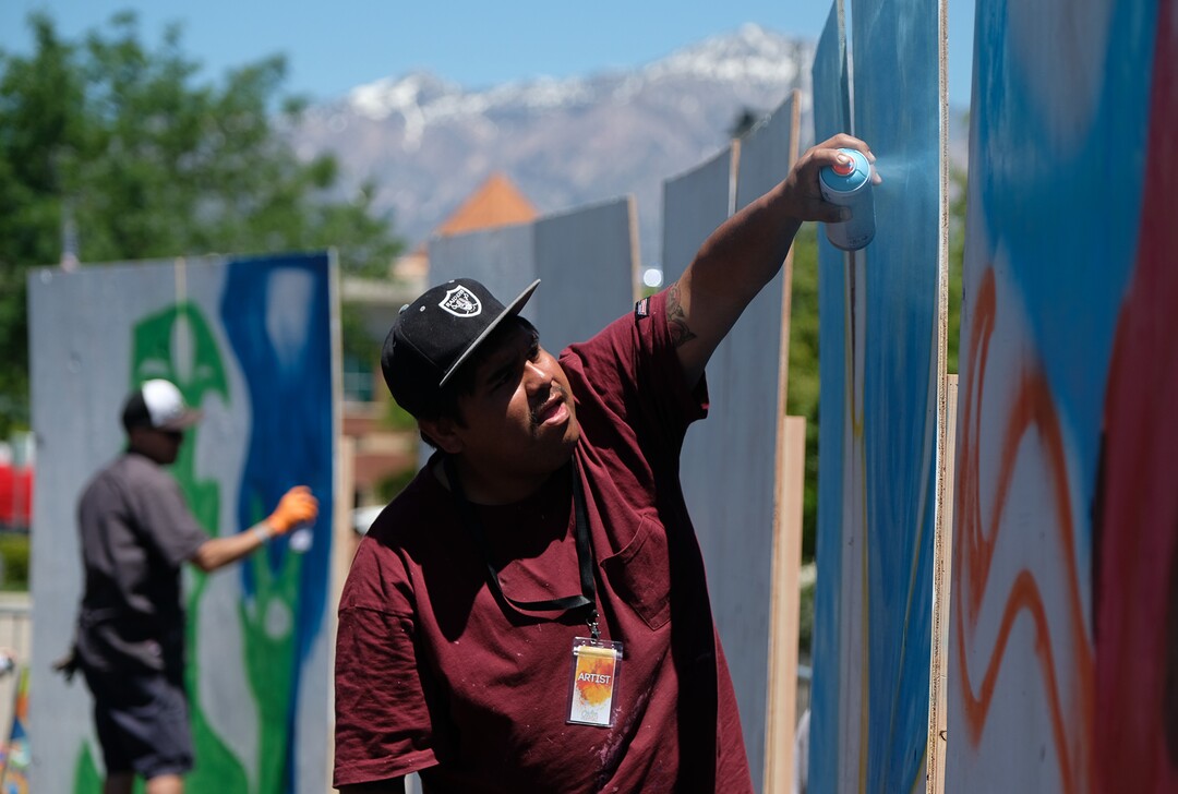 (Francisco Kjolseth  |  The Salt Lake Tribune)  Alexander Cervantes creates a spray paint mural as the Ogden Arts Festival brings local and regional artists, creatives and entertainers to Ogden, UT on June 8th and 9th. The Ogden Arts Festival returned to the historic Union Station located in the heart of downtown. Managed by Nurture the Creative Mind and held as a fundraiser for the organization, the event was complete with artist booths, music, theater, kidÕs activities, urban arts area, skateboarding games and artisan food vendors.