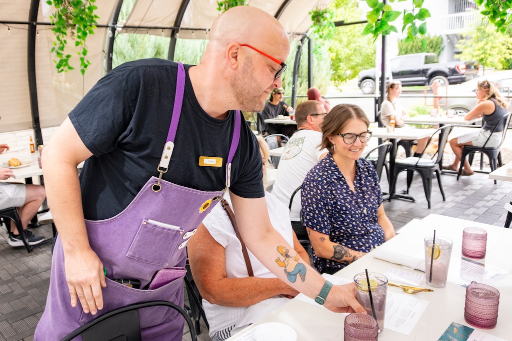 (Rick Egan | The Salt Lake Tribune)  Derek Emeroy, waits tables at the Violet restaurant, on Saturday, August 9, 2025.