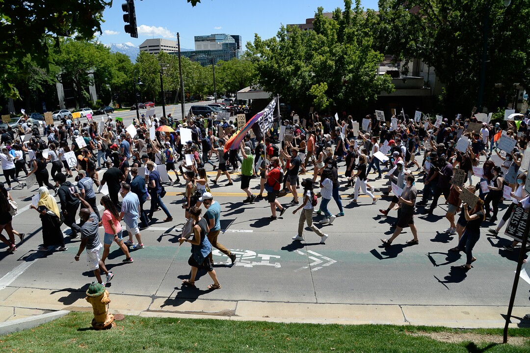 (Francisco Kjolseth  |  The Salt Lake Tribune) Demonstrators march the streets of downtown Salt Lake City for a protest as part of a series of Juneteenth celebrations on Friday, June 19, 2020.