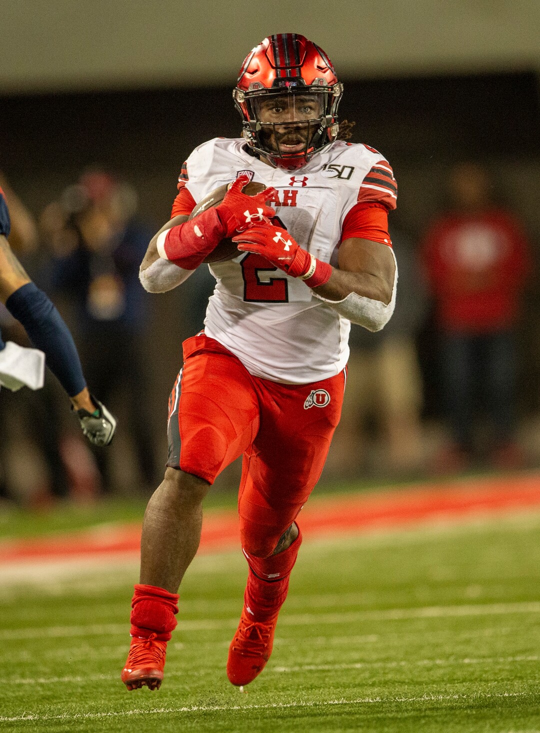 (Rick Egan  |  The Salt Lake Tribune)      Utah running back Zack Moss (2) runs the ball for the Utes, in PAC-12 action between the Utah Utes and the Arizona Wildcats in Tucson, Saturday, Nov. 23, 2019.