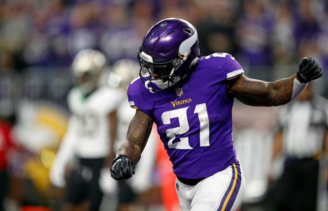 Minnesota Vikings running back Jerick McKinnon (21) celebrates a touchdown against the New Orleans Saints during the first half of an NFL divisional football playoff game in Minneapolis, Sunday, Jan. 14, 2018. (AP Photo/Charlie Neibergall)