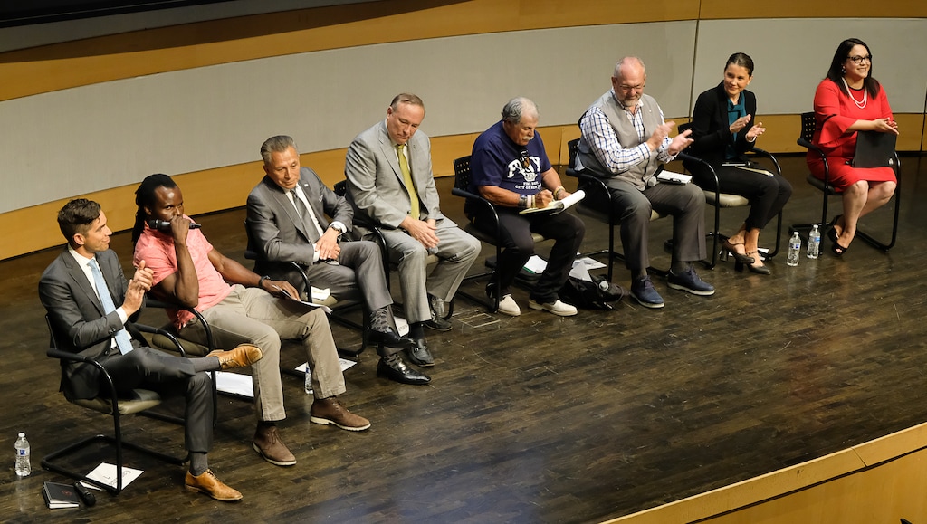 (Francisco Kjolseth | The Salt Lake Tribune) All eight of the candidates for Salt Lake City mayor gather for a debate at the Salt Lake City Library on Wed. June 26, 2019, which includes, from left, David Garbett, Abi Olufeko standing in for Rainer Huck, David Ibarra, Jim Dabakis, Richard Goldberger, Stan Penfold, Erin Mendenhall and Luz Escamilla. The debate was hosted by the ABU Education Fund and the University of Utah’s John R. Park Debate Society and moderated by Averie Vockel.