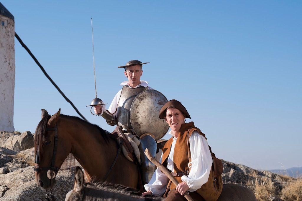 (Courtesy IFC Films) Steve Coogan (left) and Rob Brydon, playing fictionalized versions of themselves, endure dressing like Don Quixote and Sancho Panza while on a driving-and-eating tour of Spain, in the comedy "The Trip to Spain."