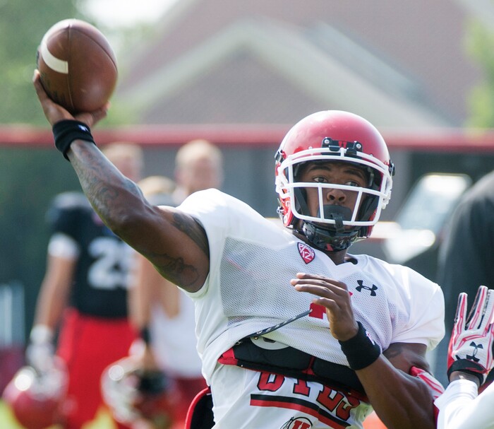 (Rick Egan  |  The Salt Lake Tribune)

Utah quarterback Troy Williams throws a pass during practice, Monday, August 7, 2017.


