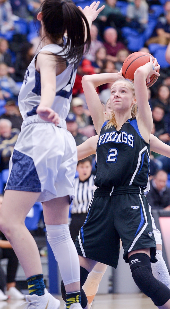 (Leah Hogsten  |  The Salt Lake Tribune)  Pleasant Grove's Sydney Valgardson aims for the net.   Copper Hills High School girls' basketball team defeated Pleasant Grove High School 66-25 during their Class 6A girls' basketball playoff opener at Salt Lake Community College Tuesday, Feb. 20, 2018. 