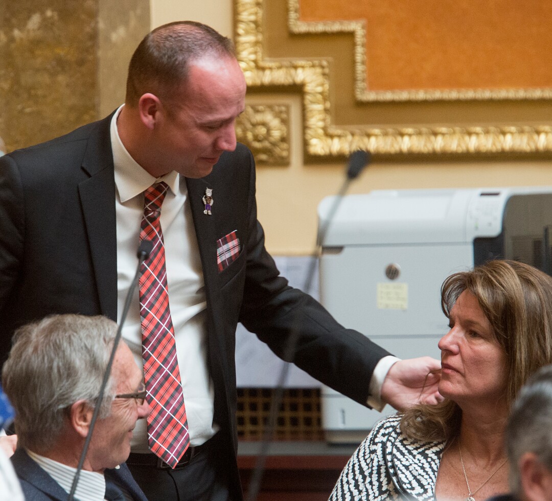 (Rick Egan  |  The Salt Lake Tribune)    Rep. Justin Fawson comforts Laura Warburton, the mother of Hannah Warburton, who took her own life a few in 2014, as the they discuss HB 41, which has become known as "Hannah's Bill" on the floor of the House of Representatives, Friday, January 26, 2018.