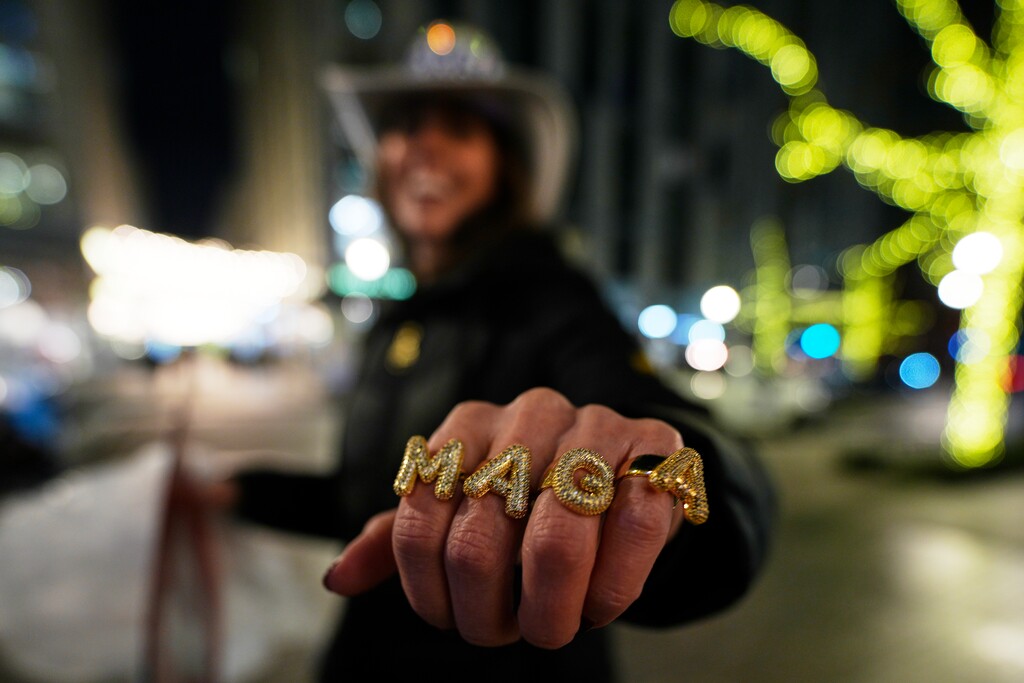 Alicia DeVinney from Phoenixville, Pa., shows off her MAGA rings ahead of the 60th Presidential Inauguration, Sunday, Jan. 19, 2025, in Washington. (AP Photo/Mike Stewart)