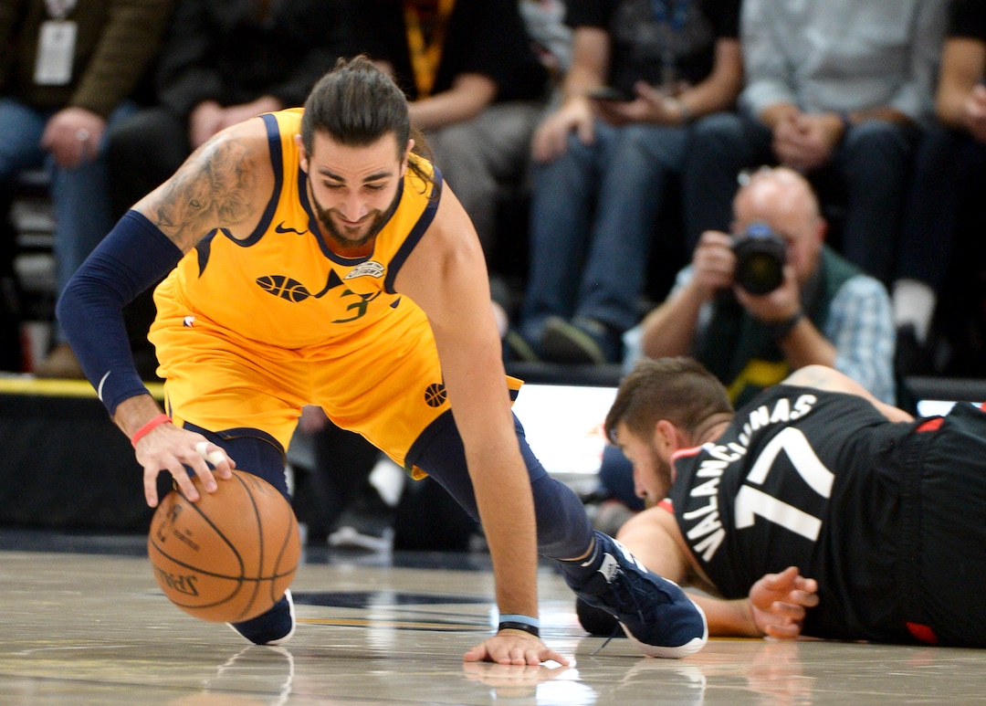 Leah Hogsten  |  The Salt Lake Tribune  Utah Jazz guard Ricky Rubio (3) hits the deck with Toronto Raptors center Jonas Valanciunas (17) trying to get the rebound as the Utah Jazz host the Toronto Raptors, Monday, Nov. 5, 2018 at  Vivint Smart Home Arena.