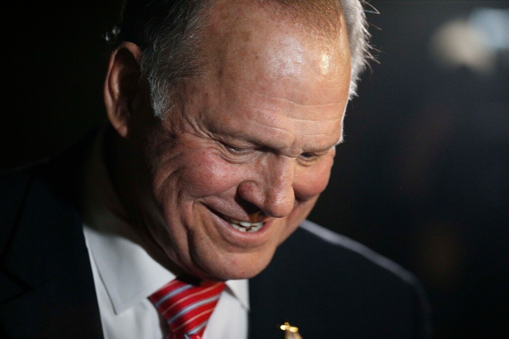 Former Alabama Chief Justice and U.S. Senate candidate Roy Moore leaves after he speaks at a church revival, Tuesday, Nov. 14, 2017, in Jackson, Ala. (AP Photo/Brynn Anderson)