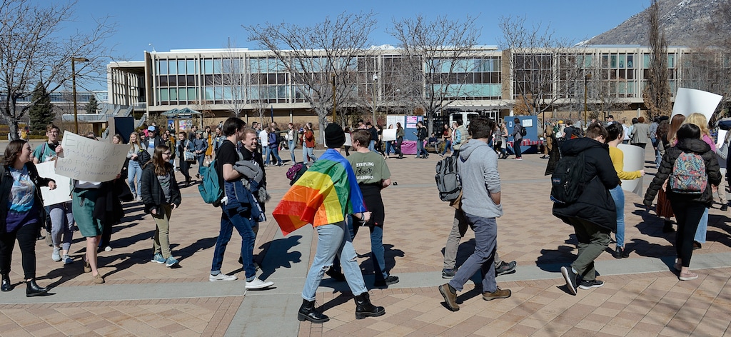 (Francisco Kjolseth | Tribune file photo) Students protest outside the student center at Brigham Young University in Provo, Utah, on Wednesday, March 4, 2020, after an official with the Church of Jesus Christ of Latter-day Saints school issued a clarification to the school's Honor Code, which said that same-sex romantic behavior is still "not compatible" with the rules at BYU. Brigham Young University in Utah says “same-sex romantic behavior” isn't allowed on campus, even under recent changes to its strict code of conduct.