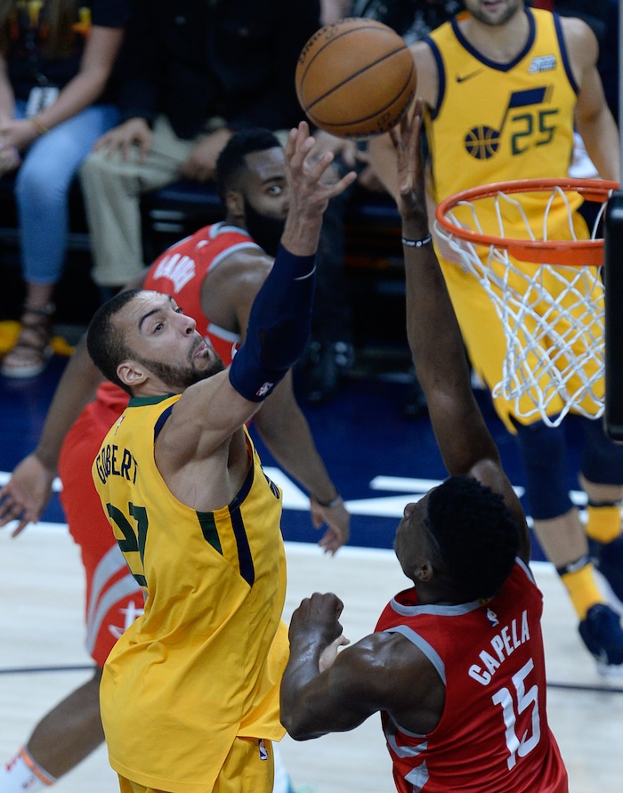 (Francisco Kjolseth | The Salt Lake Tribune) Utah Jazz center Rudy Gobert (27) gets blocked by Houston Rockets center Clint Capela (15) in the fourth period of Game 4 of the NBA playoffs at the Vivint Smart Home Arena Sunday, May 6, 2018 in Salt Lake City. Houston took a 3-1 series lead over the Jazz with a final score of 100 to 87.