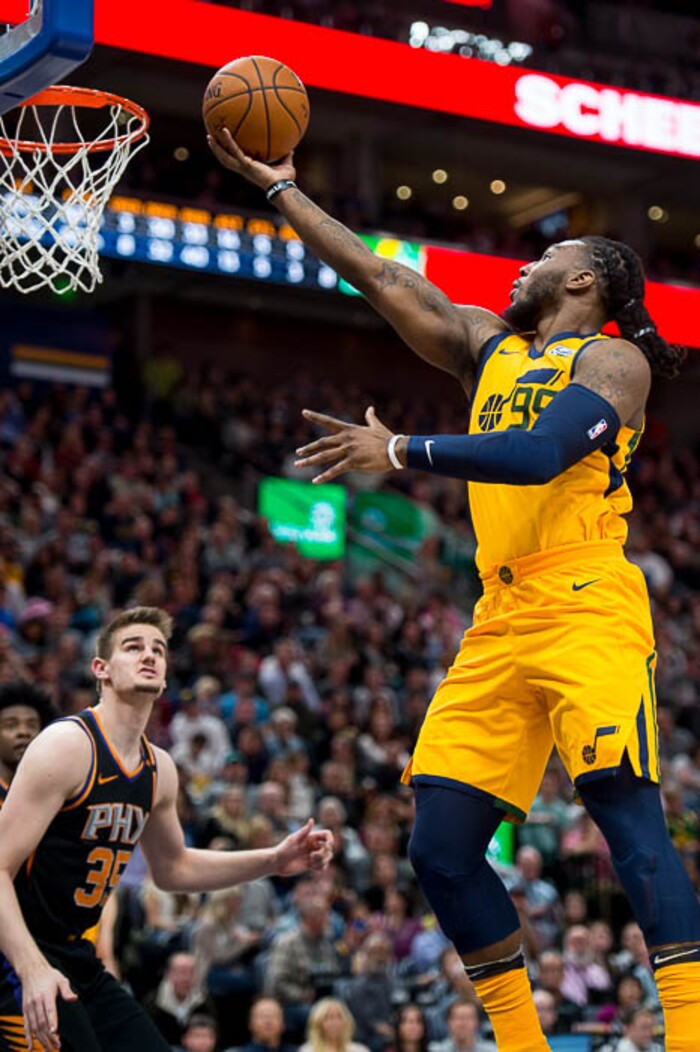 (Trent Nelson | The Salt Lake Tribune)  Utah Jazz forward Jae Crowder (99) scores as the Utah Jazz host the Phoenix Suns, NBA basketball in Salt Lake City, Wednesday Feb. 14, 2018. Phoenix Suns forward Dragan Bender (35) at left.