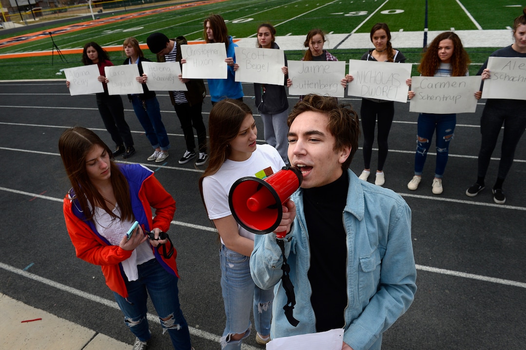Scott Sommerdorf | The Salt Lake TribuneStudent organizer Isaac Reese addresses the crowd of students who walked out of class at Brighton High and gathered in the football stadium. The students read aloud the names of each of the 17 students and staff killed at Marjory Stoneman Douglas High School, during their walkout at Brighton High School, Wednesday, March 14, 2018.