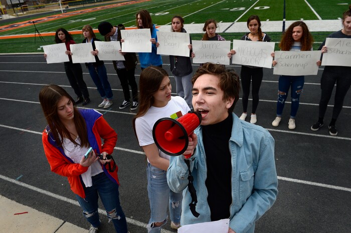 Scott Sommerdorf | The Salt Lake Tribune
Student organizer Isaac Reese addresses the crowd of students who walked out of class at Brighton High and gathered in the football stadium. The students read aloud the names of each of the 17 students and staff killed at Marjory Stoneman Douglas High School, during their walkout at Brighton High School, Wednesday, March 14, 2018.
