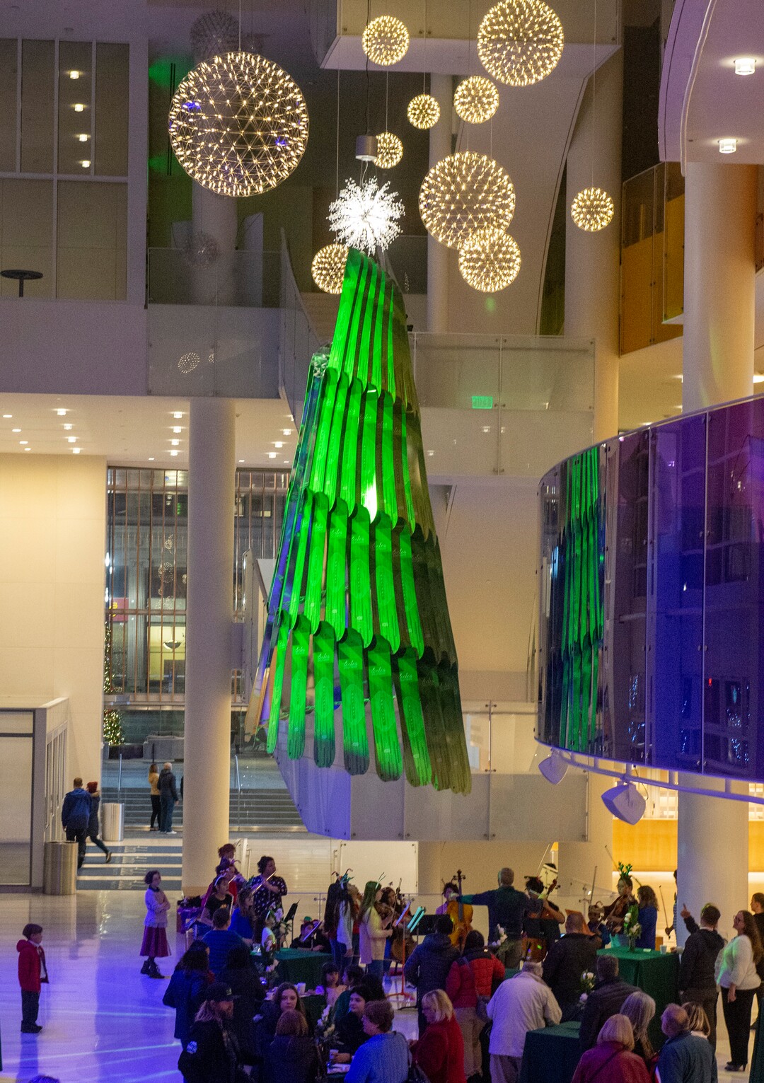 (Rick Egan  |  The Salt Lake Tribune)  Eccles Theater unveils its annual Holiday Tree art installation, Monday, Dec. 2, 2019. The title is "Winter Wind," created by Rob Beishline & Shelley Beishline of Tooza Design. The work features 75 snowboards.