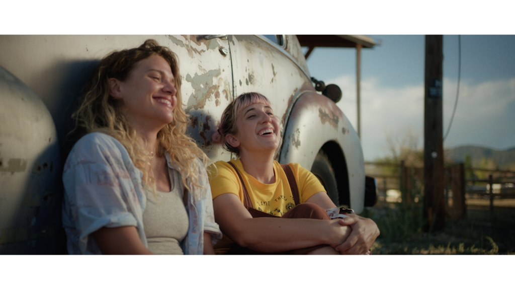 (Decal) Blake (Mallory Everton, left) and Jamie (Whitney Call) are sisters on a road trip during the early days of the COVID-19 pandemic in the comedy "Stop and Go," which Call and Everton wrote. Everton recently discussed the importance of humor and laughter to people of faith.