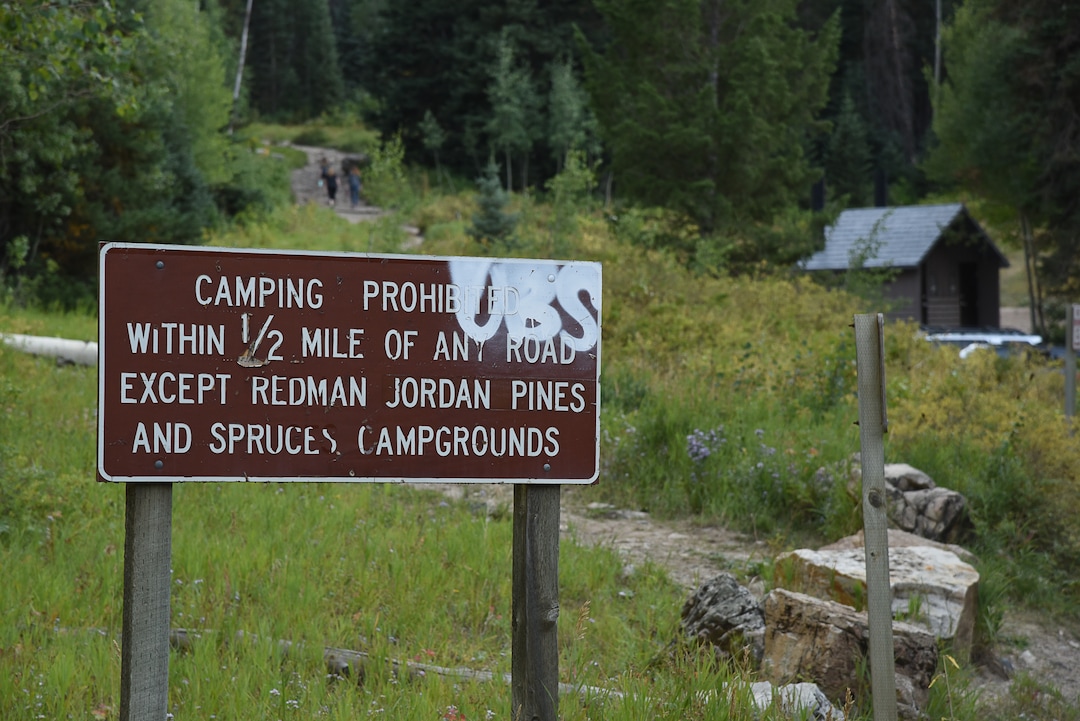(Francisco Kjolseth  |  The Salt Lake Tribune)  Graffiti  is apparent on most signs along the popular Donut Falls trail on Friday, Aug. 31, 2018, in Big Cottonwood Canyon which draws regular crowds.