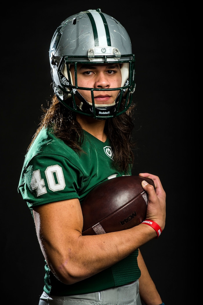 (Chris Detrick | The Salt Lake Tribune) Olympus tight end Cameron Latu poses for a portrait Wednesday, December 13, 2017.