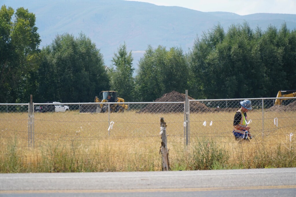 (Grace Doerfler | KPCW) Construction crews worked at the site of the Heber Valley Temple along Center Street, Aug. 28, 2025.