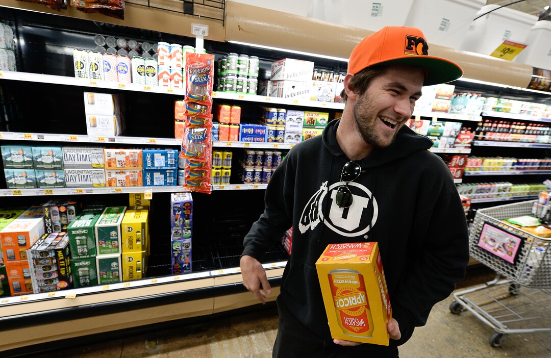 (Francisco Kjolseth  |  The Salt Lake Tribune)  Andy Shafer picks out a fresh pack of Wasatch beer as he visits the beer isle at Smith's Marketplace in Bountiful filled with the new beer that is 5% alcohol by volume on Friday, Nov. 1, 2019, for the first time in 86 years.
