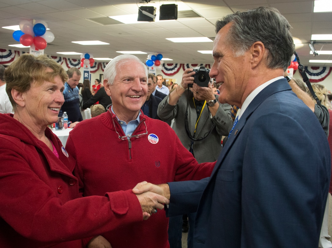 (Rick Egan  |  The Salt Lake Tribune)   Mitt Romney  greets Roxanne and Steve Shallenburger, at the Romney Headquarters, in Orem, as they wait for the polls to close, on election night, Tuesday, Nov. 6, 2018.