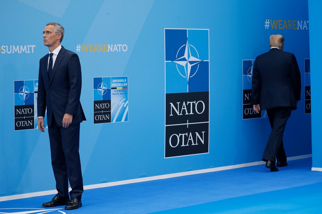 (Pablo Martinez Monsivais | The Associated Press) President Donald Trump, right, walks away after being greeted by NATO Secretary General Jens Stoltenberg, left, before a summit of heads of state and government at NATO headquarters in Brussels on Wednesday, July 11, 2018. NATO leaders gather in Brussels for a two-day summit to discuss Russia, Iraq and their mission in Afghanistan.