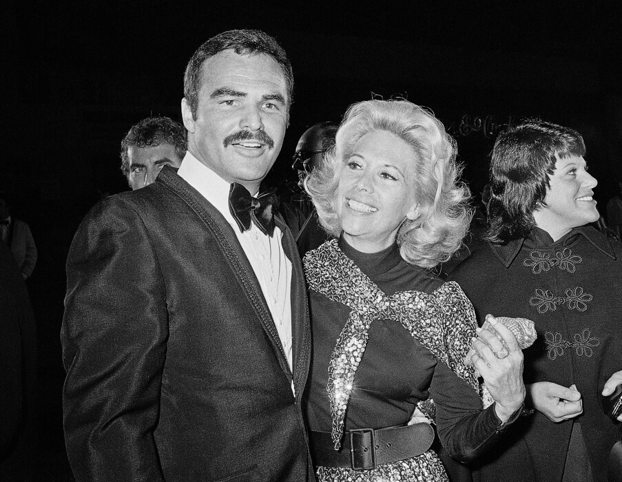 FILE - In this Nov. 5, 1971 file photo, actress Dinah Shore and Burt Reynolds appear together in Los Angeles. Reynolds, who starred in films including "Deliverance," "Boogie Nights," and the "Smokey and the Bandit" films, died at age 82, according to his agent. (AP Photo/Harold Filan, File)