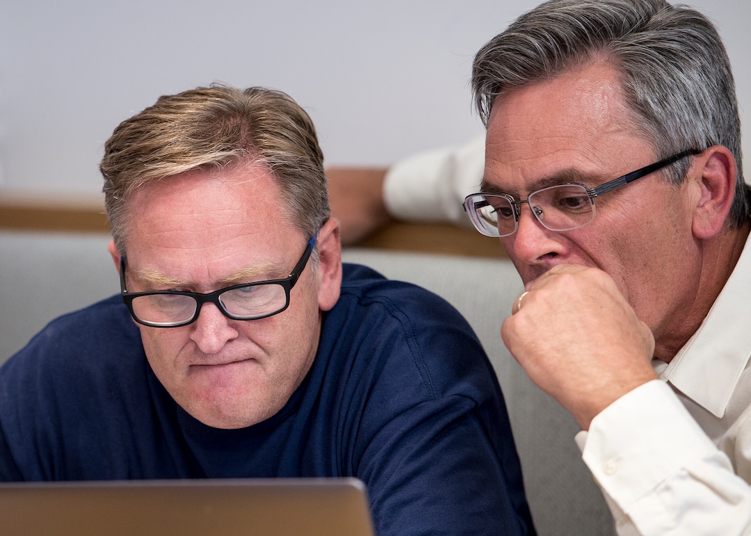 (Leah Hogsten  |  The Salt Lake Tribune) l-r Co-campaign managers Craig Frank and Ken Sumsion look at the polls Tuesday, August 15, 2017 for former state Rep. Chris Herrod on election night. Registered Republican voters in the 3rd Congressional District will decide whether Provo Mayor John Curtis, former state Rep. Chris Herrod or businessman Tanner Ainge moves forward to the general election. The winner takes on Democrat Kathie Allen and the United Utah PartyÕs Jim Bennett, as well as a handful of independent and third-party candidates, on Nov. 7.