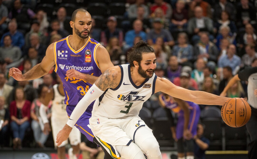 (Rick Egan  |  The Salt Lake Tribune) Utah Jazz guard Ricky Rubio (3) goes for a loose ball as Sydney Kings guard Perry Ellis (34) defends, in preseason basketball Utah Jazz vs.Sydney Kings, in Salt Lake City, Sunday, October 2, 2017.