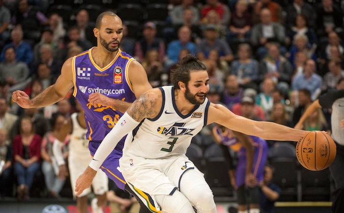 (Rick Egan  |  The Salt Lake Tribune) Utah Jazz guard Ricky Rubio (3) goes for a loose ball as Sydney Kings guard Perry Ellis (34) defends, in preseason basketball Utah Jazz vs.Sydney Kings, in Salt Lake City, Sunday, October 2, 2017.


