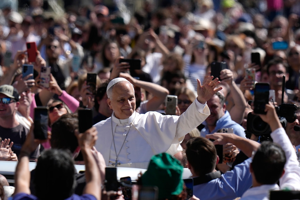 Pope Leo XIV arrives for his weekly general audience in St. Peter's Square, at the Vatican, Wednesday, May 20, 2026. (AP Photo/Alessandra Tarantino)