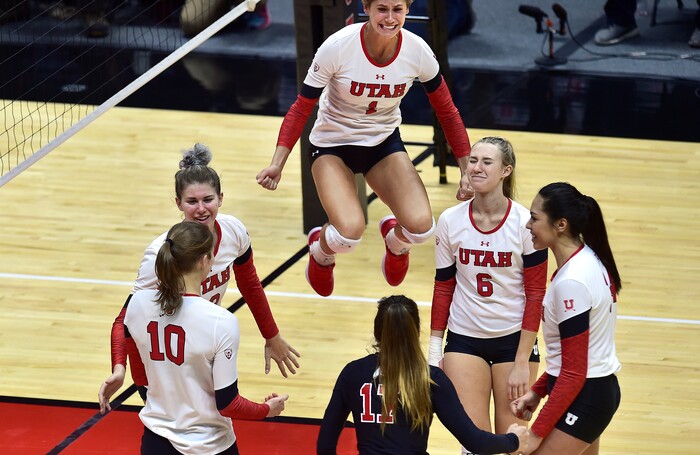 (Scott Sommerdorf   |  The Salt Lake Tribune)   Utah's Dani Barton jumps as she celebrates a point to give Utah match point during third set play. Utah beat Purdue three sets to one in the second round of the NCAA volleyball tournament, Friday, December 1, 2017.  