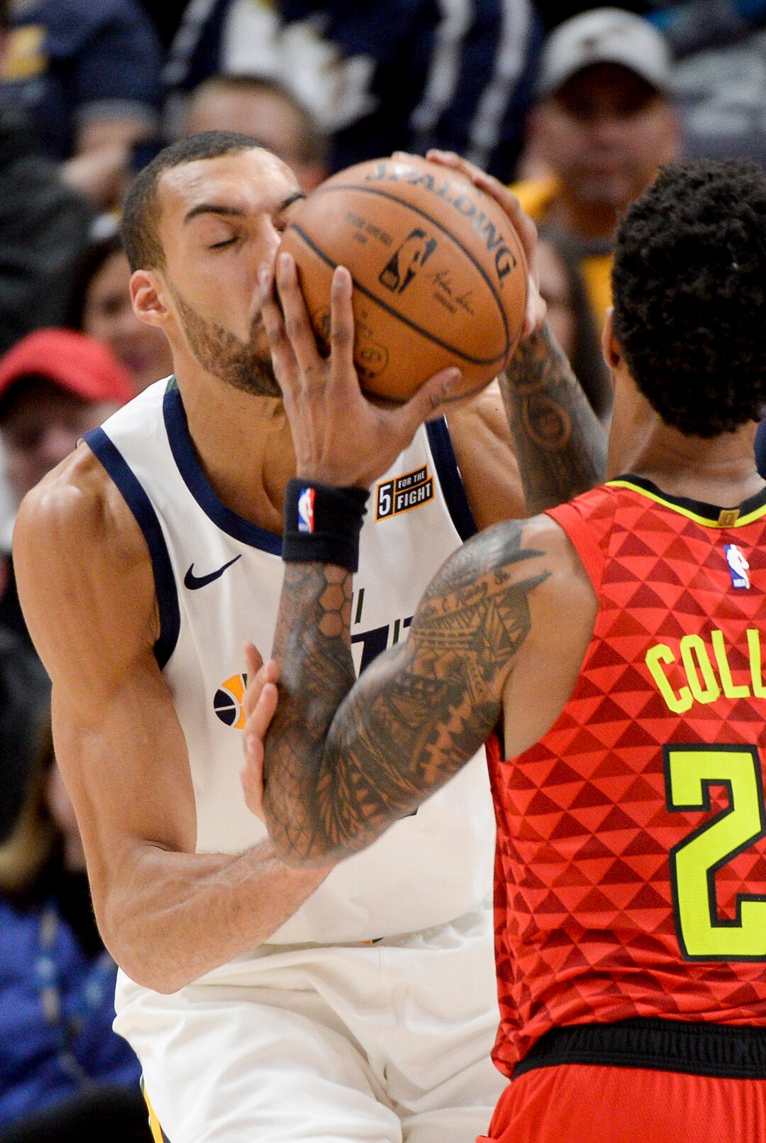 Leah Hogsten  |  The Salt Lake Tribune  Utah Jazz center Rudy Gobert (27) collides with Atlanta Hawks forward John Collins (20) as the Utah Jazz take on the Atlanta Hawks, Feb. 1, 2019 at Vivint Smart Home Arena. 