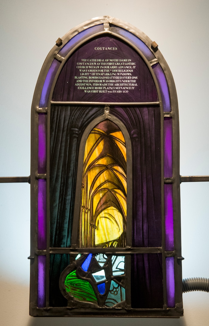 (Rick Egan  |  The Salt Lake Tribune)      Coutances, France, Cathedral de Notre Dame, is part of the the McDonald Windows, stained glass exhibit, "Remembered Light," which features fragments from World War II windows. The exhibit brought to Utah by the Salt Lake Interfaith Roundtable & the Peace Committee of the Utah District of Rotary International. The exhibit runs through Nov 17, at 175 South Main, in Salt Lake City. Monday, Oct. 29, 2018.


