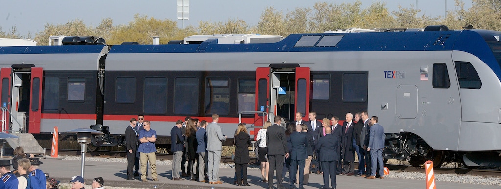 (Tribune file photo) Stadler company officers and Utah leaders tour one of Stadler's new TEXRail trains. The company broke ground for a new Stadler plant at 100 S. 5600 W. in Salt Lake City Friday Oct. 13, 2017. Stadler US, is an affiliate of a Swiss railcar-manufacturing company. The project has received a tax incentive from the Governor's Office of Economic Development, which anticipates it will result in the creation of dozens of new, high-paying jobs.