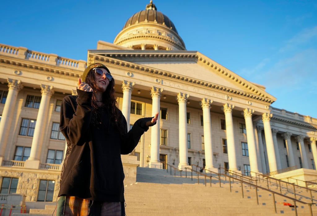 (Bethany Baker | The Salt Lake Tribune) Aspen Azalea, a woman arrested and tossed to the ground during a Utah County Planning Commission meeting on data center land use, speaks during a protest at the Utah Capitol in Salt Lake City on Wednesday, Oct. 21, 2026.