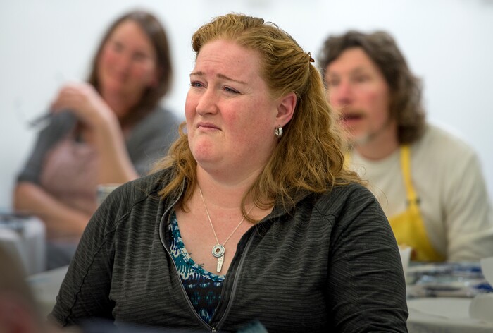 (Leah Hogsten  |  The Salt Lake Tribune) Christine McDonough and her fellow painters reveal their frustrations with the speed and effortlessness that former television star painter, the late Bob Ross, as they try to follow along with the 22 minute painting tutorial video at a Bob Ross Paint-Along class, Saturday, Jan. 6, 2018, at the Salt Lake City Public Library's Sweet Branch in the Avenues.