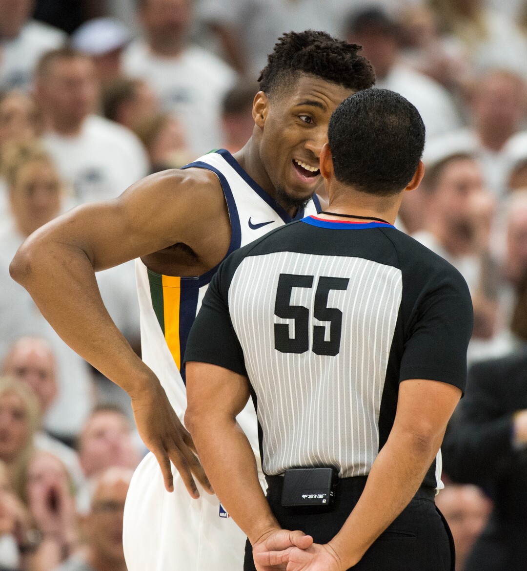 (Rick Egan  |  The Salt Lake Tribune)    Utah Jazz guard Donovan Mitchell (45) has a few words with referee Bill Kennedy (55) after Utah Jazz head coach Quin Snyder was called for a technical foul, in game 4, NBA playoff action between Utah Jazz and Oklahoma City Thunder, in Salt Lake City, Monday April 23, 2018.