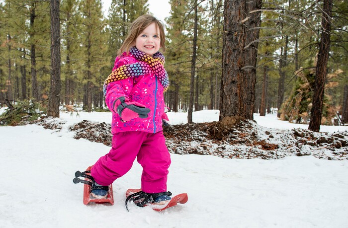 (Rick Egan | The Salt Lake Tribune) Three-year-old MacKenzie Flynn, from Draper, takes a tour of the Dixie National Forest on a snowshoes, during the 36th annual Ruby's Inn, Bryce Canyon Winter Festival on Saturday, Feb. 13, 2021.