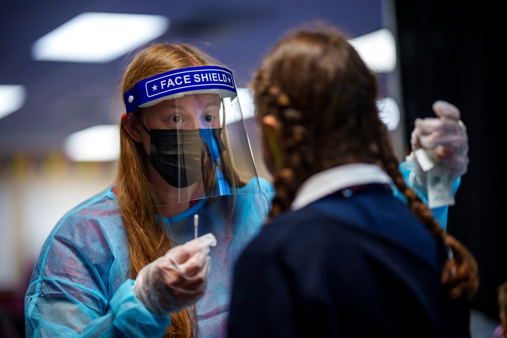 (Trent Nelson | The Salt Lake Tribune) School nurse Karen Thelin tests a student for COVID-19 at American Preparatory Academy in Draper on Sept. 14, 2021. American Preparatory Academy schools requested 9,040 tests from the Utah Department of Health for voluntary testing, to prevent the spread of the virus.