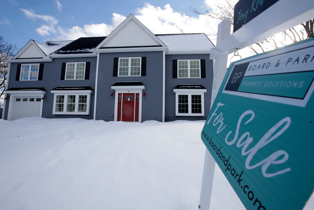 (Steven Senne  |  AP file photo) This Feb. 21, 2019, file photo shows a newly constructed home with a fore sale sign in Natick, Mass. On Thursday, April 11, Freddie Mac reports on this week's average U.S. mortgage rates.