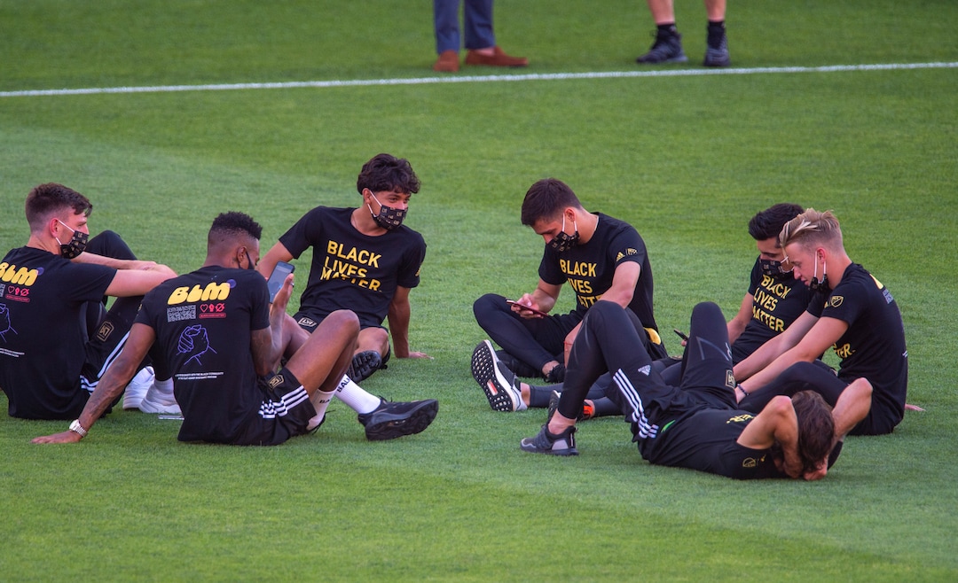 (Rick Egan  |  The Salt Lake Tribune)     Players mingle on the field wearing Black Lives Matter shirts, in the empty stadium as the game between Real Salt Lake and LAFC was postponed after teams in sports leagues across the country boycotted scheduled games to protest the police shooting of Jacob Blake, RSL and LAFC followed suit, along with the rest of MLS, on Wednesday, Aug. 26, 2020.