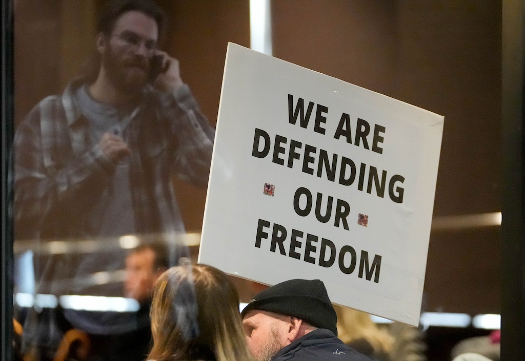 (Francisco Kjolseth | The Salt Lake Tribune) People gather inside the Salt Lake County Government Center chamber on Tuesday, Jan. 11, 2022, to protest the recent mask mandate issued by the Salt Lake County Health Department and Mayor Jenny Wilson. Several public commenters referenced fringe conspiracy theories to argue against the mask order.