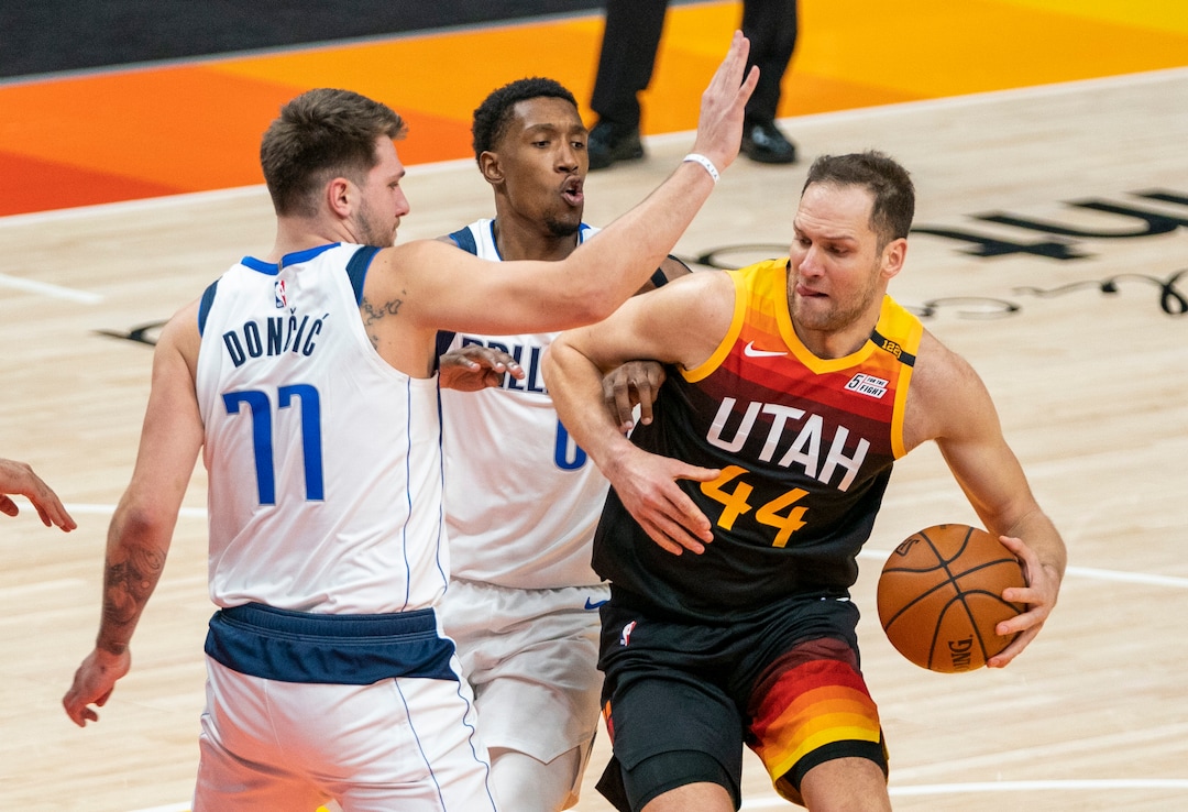 (Rick Egan | The Salt Lake Tribune)  Utah Jazz forward Bojan Bogdanovic (44) takes the ball to the hoop, as Dallas Mavericks guard Josh Richardson (0) and Dallas Mavericks guard Luka Doncic (77) defend, in NBA action between the Utah Jazz and the Dallas Mavericks at Vivint Arena, on Friday, Jan. 29, 2021.