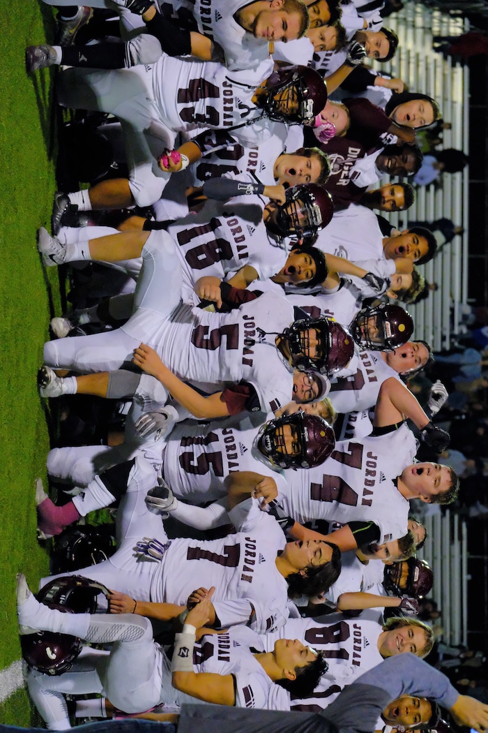 (Leah Hogsten  |  The Salt Lake Tribune) Jordan celebrates the win. Jordan High School boys' football team defeated Viewmont High School 28-20 during their class 5A football playoff opener, Friday, October 27, 2017 in Bountiful.