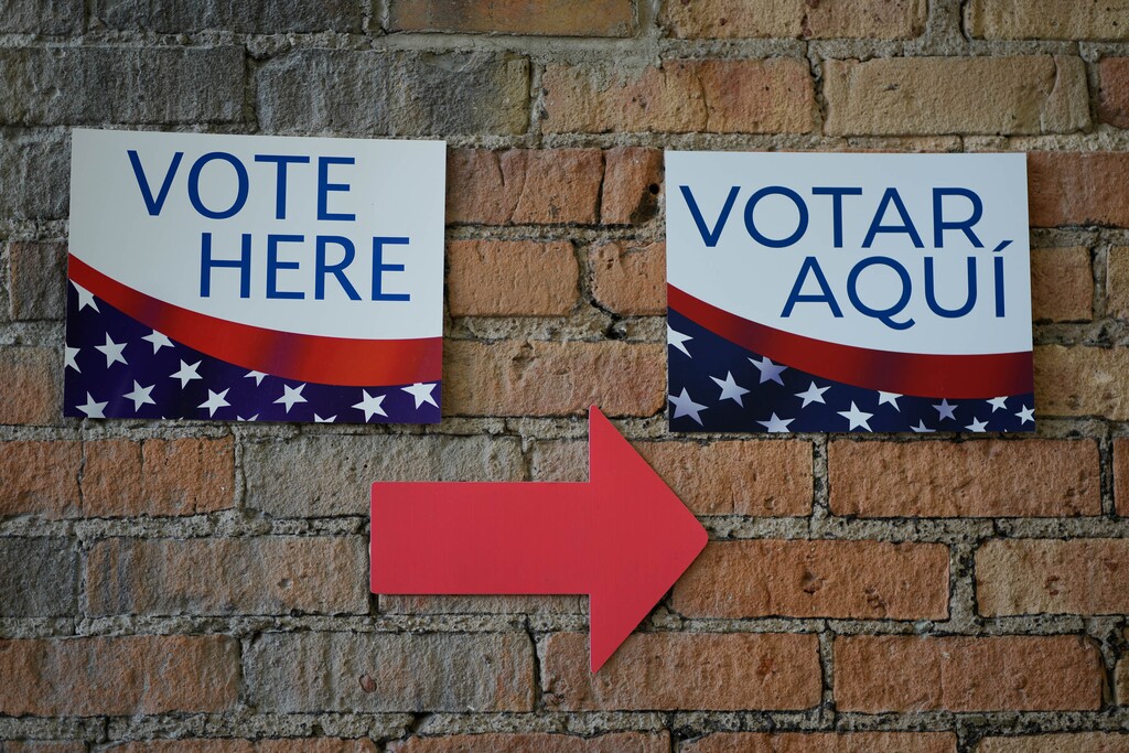 (Francisco Kjolseth | The Salt Lake Tribune) Signs direct people arriving to vote at Trolley Square in Salt Lake City during primary Election Day on Tuesday, June 28, 2022.