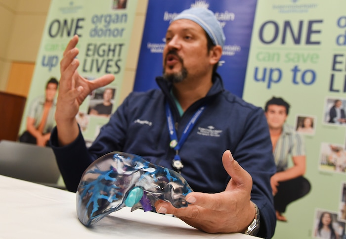 (Francisco Kjolseth  |  The Salt Lake Tribune)  Transplant surgeon Manuel Rodriguez-Davalos, MD, medical director of Intermountain Healthcare's Living Donor Liver Transplant Program discusses a recent surgery where Brandon Finlayson, donated part of his liver to his mother Gwen in the first ever left lobe living liver transplant in Utah. A 3-D printed model of the living donor's liver was created as reference before and during the surgery by transplant team.