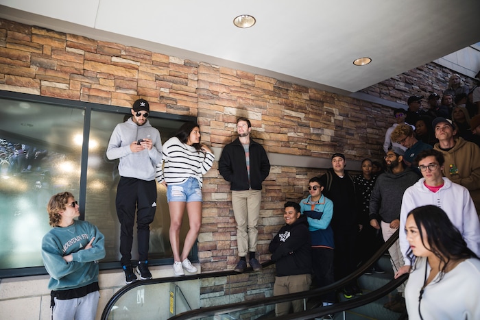 (Clark Clifford  |  Special to The Salt Lake Tribune) People filling and standing on top of escalators in attempt for a better view of Kanye West's "Sunday Service" at The Gateway in Salt Lake City on Saturday, Oct. 5, 2019.
