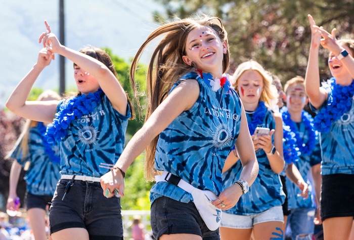(Rick Egan | The Salt Lake Tribune) Students from Layton High dance in the Layton Liberty Days Parade, on Monday, July 5, 2021.