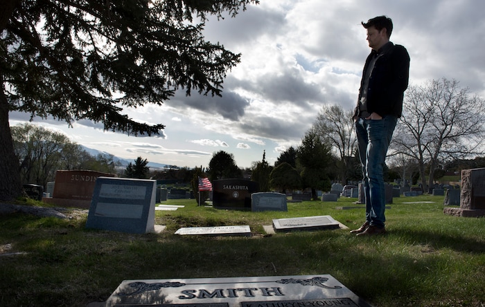(Scott Sommerdorf | The Salt Lake Tribune)
City Councilman Chris Wharton, who represents the area around the Salt Lake City Cemetery, visits the graves of great uncle, and great grandparents, Friday, April 13, 2018. Wharton is involved in an effort to help get more funding for the renewal of the cemetery. 

